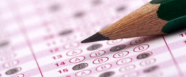 Pencil and exam answer sheet